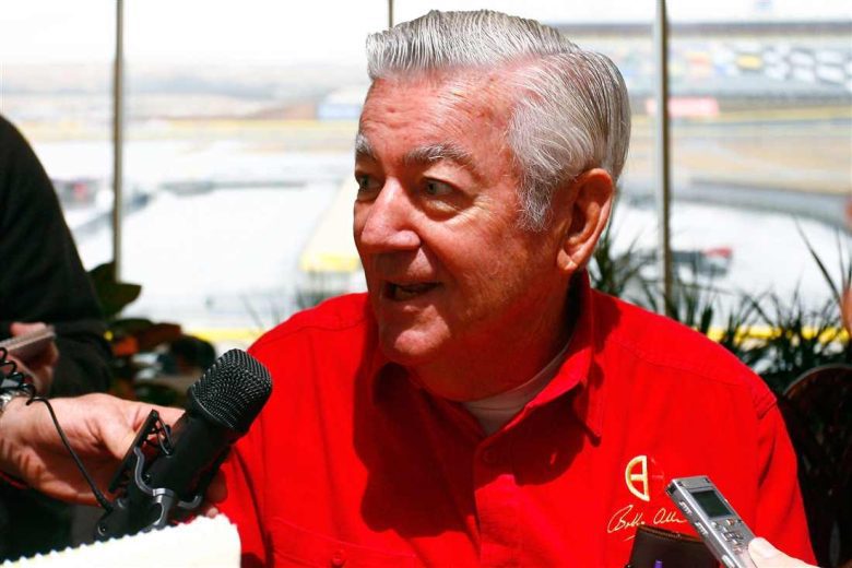 Bobby Allison looks on.