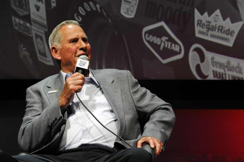 David Pearson looks on.