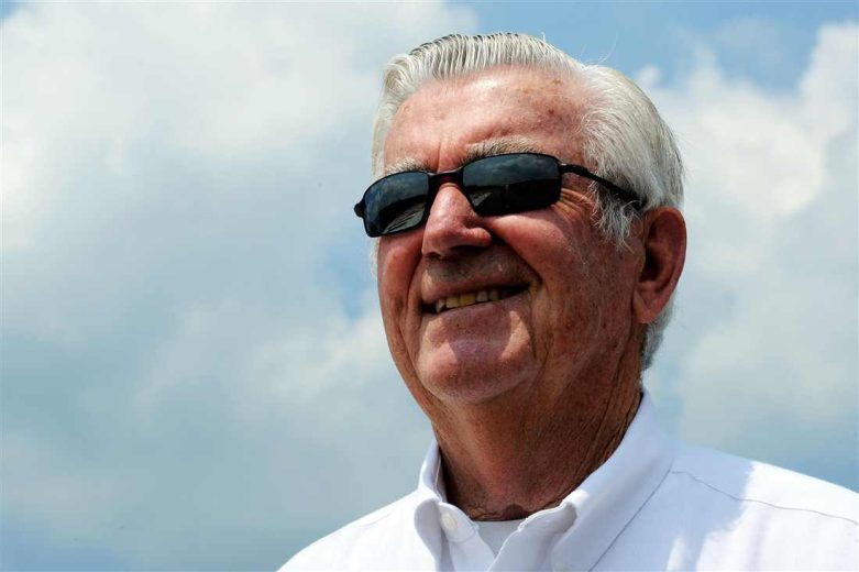 Bobby Allison looks on.