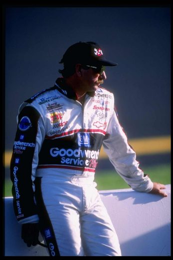 Dale Earnhardt looks on.