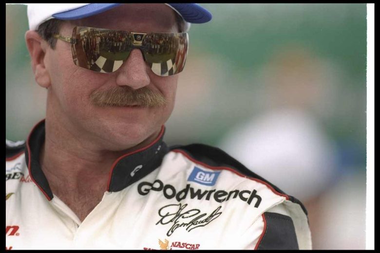 Dale Earnhardt looks on.