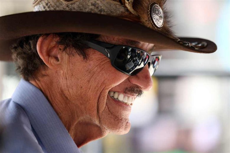 Richard Petty looks on.