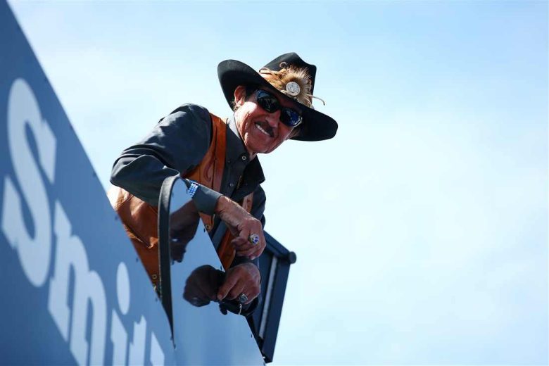 Richard Petty looks on.