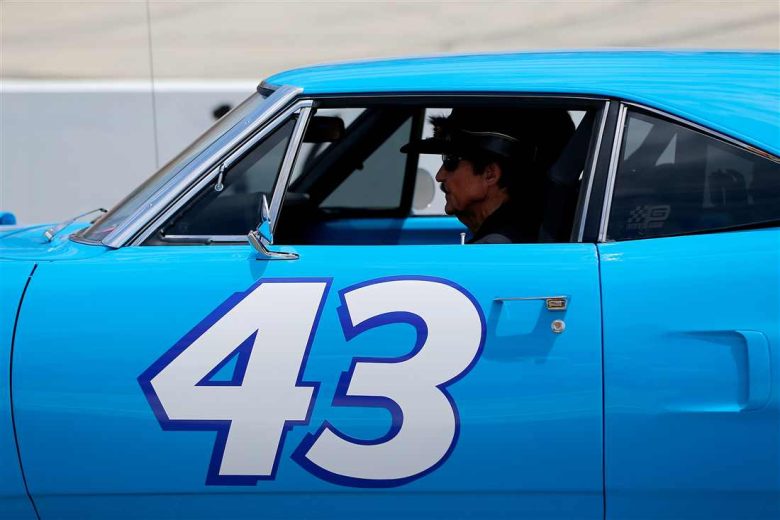 Richard Petty sits in his car.