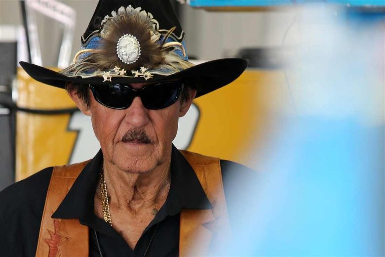 Richard Petty looks on.