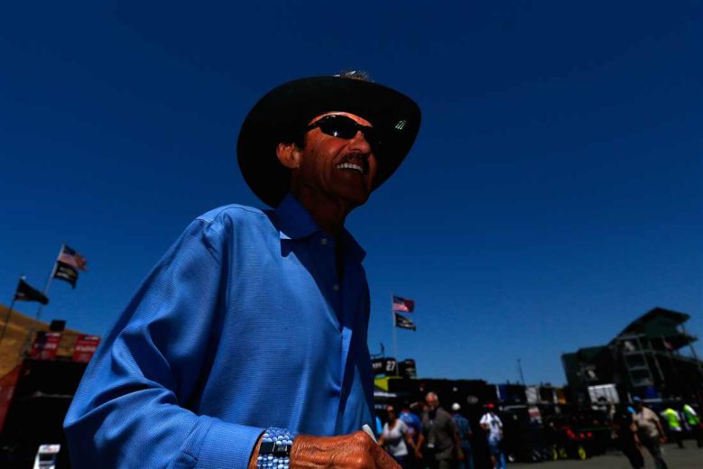 Richard Petty looks on.