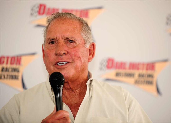 David Pearson looks on.