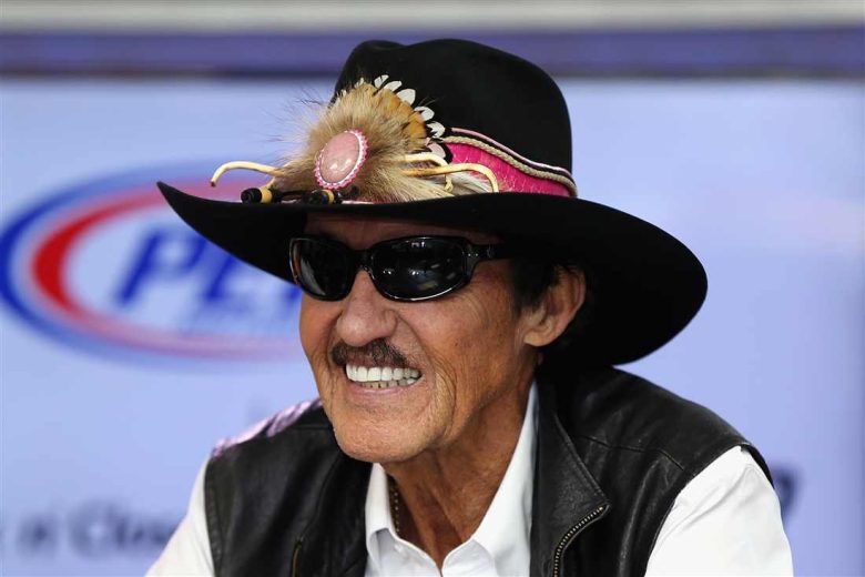 Richard Petty looks on.