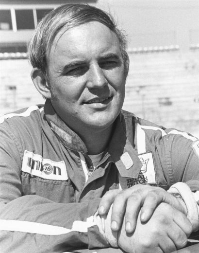 Benny Parsons looks on.