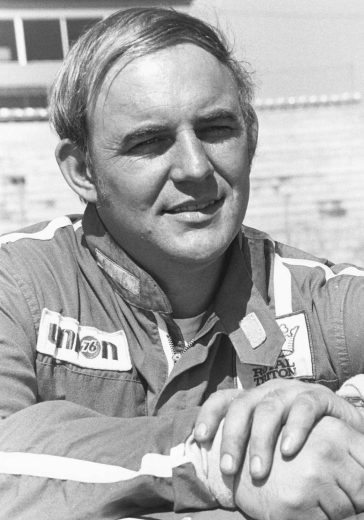 Benny Parsons looks on.