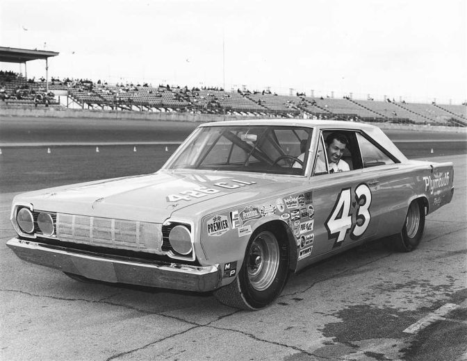 Richard Petty sits in his car.