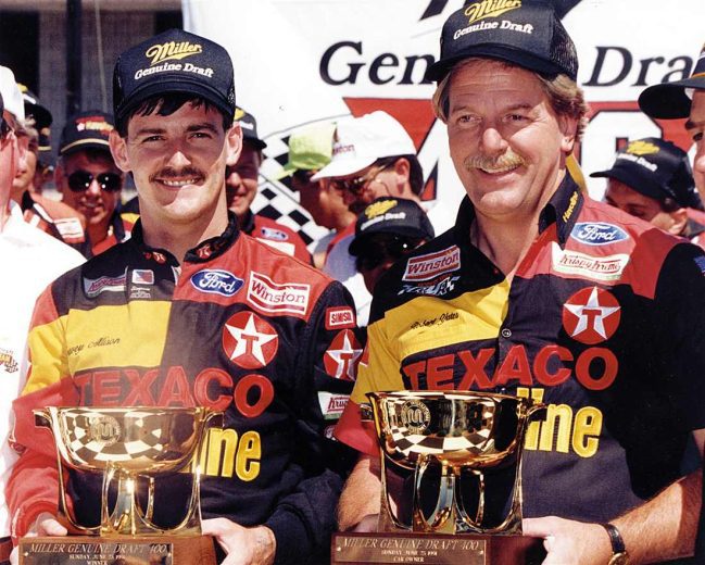 Davey Allison celebrates in Victory Lane at Michigan.