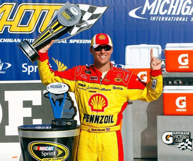 Kevin Harvick celebrates in Victory Lane at Michigan.