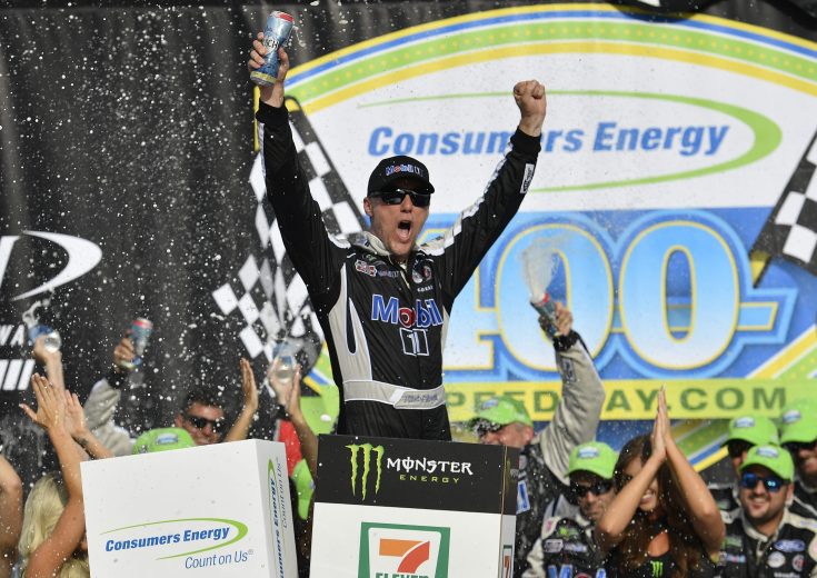 Kevin Harvick celebrates in Victory Lane at Michigan.
