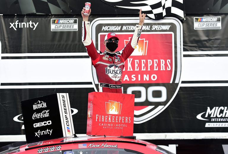 Kevin Harvick celebrates in Victory Lane at Michigan.