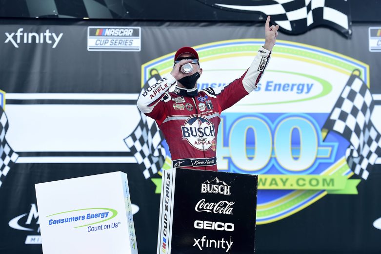 Kevin Harvick celebrates in Victory Lane at Michigan.