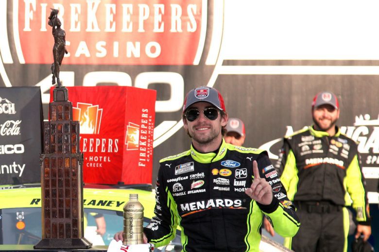 Ryan Blaney celebrates in Victory Lane at Michigan.