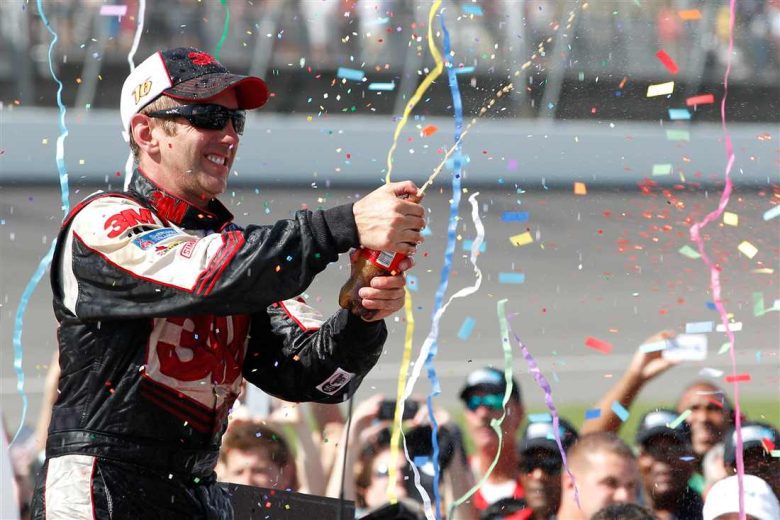 Greg Biffle celebrates in Victory Lane at Michigan.