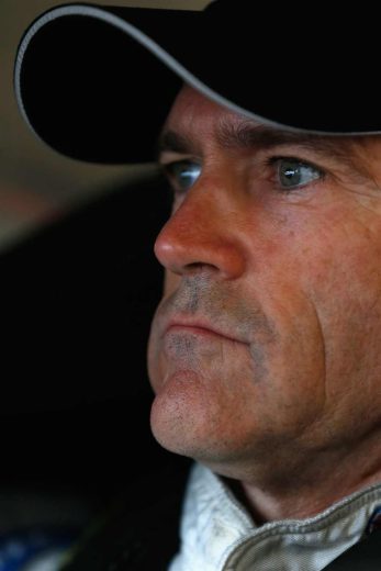 Bobby Labonte looks on.