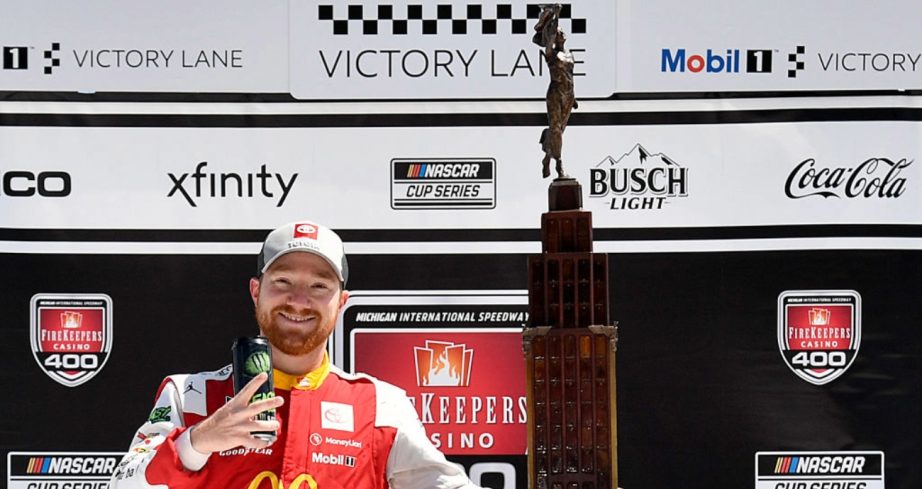 Tyler Reddick celebrates in Victory Lane at Michigan.