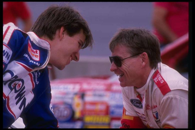 Mark Martin looks on.