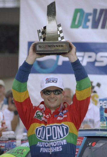 Jeff Gordon celebrates in Victory Lane at Michigan.