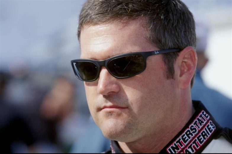 Bobby Labonte looks on.