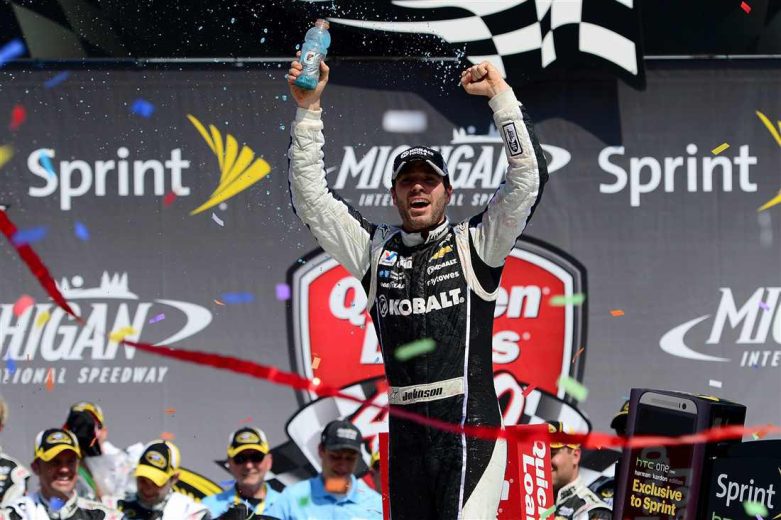 Jimmie Johnson celebrates in Victory Lane at Michigan.