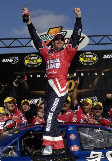Greg Biffle celebrates in Victory Lane at Michigan.