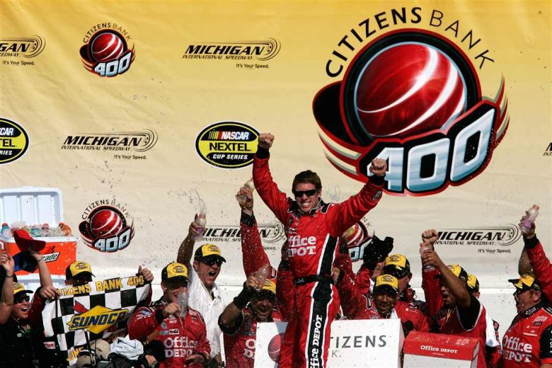 Carl Edwards celebrates in Victory Lane at Michigan.