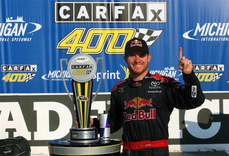 Brian Vickers celebrates in Victory Lane at Michigan.