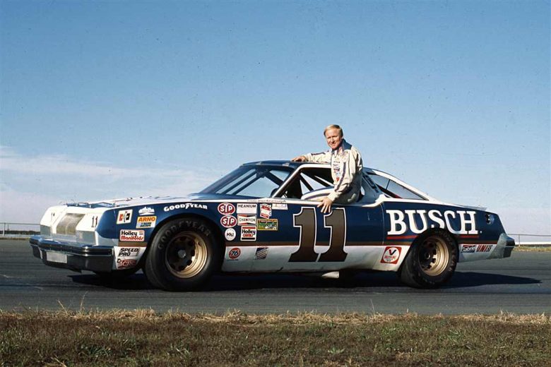 Cale Yarborough sits in his car.