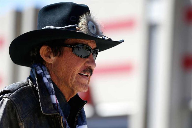 Richard Petty looks on.