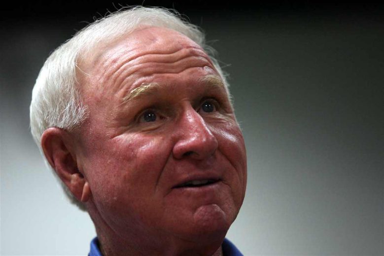 Cale Yarborough looks on.