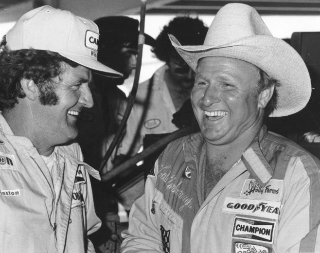Cale Yarborough looks on.