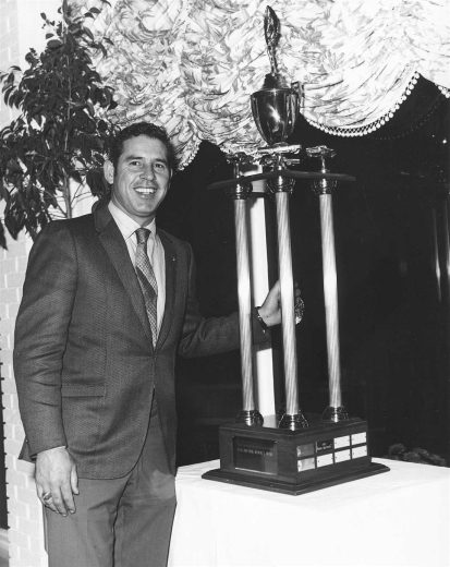 David Pearson looks on.