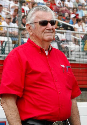 Bobby Allison looks on.
