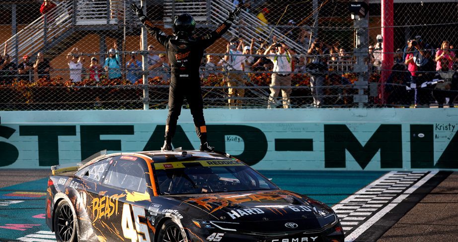tyler reddick poses for fans at homestead