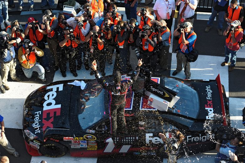 Denny Hamlin celebrates in Pocono Victory Lane.