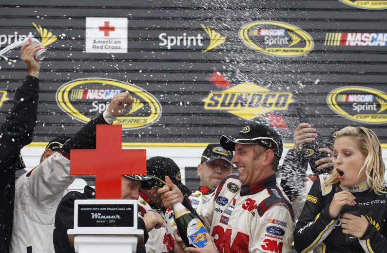 Greg Biffle celebrates in Pocono Victory Lane.