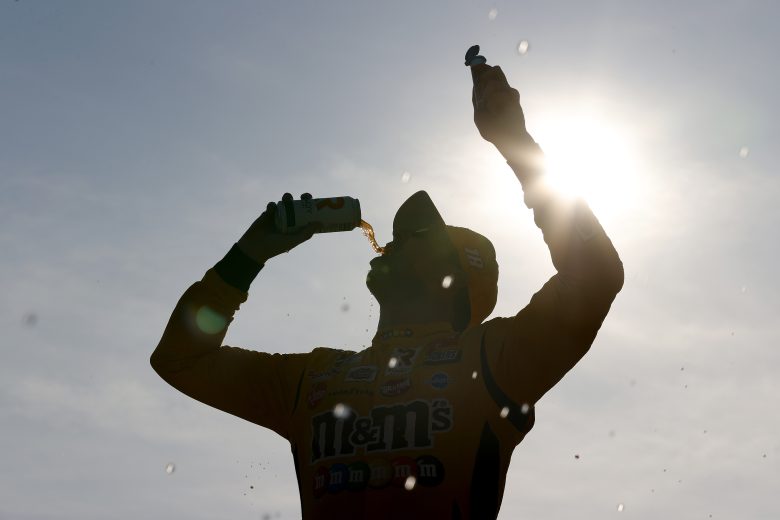 Kyle Busch celebrates in Pocono Victory Lane.