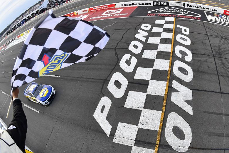 Chase Elliott crosses the finish line at Pocono Raceway