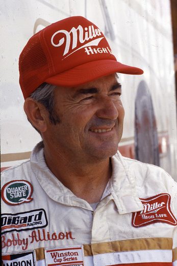 Bobby Allison smiles and looks on.