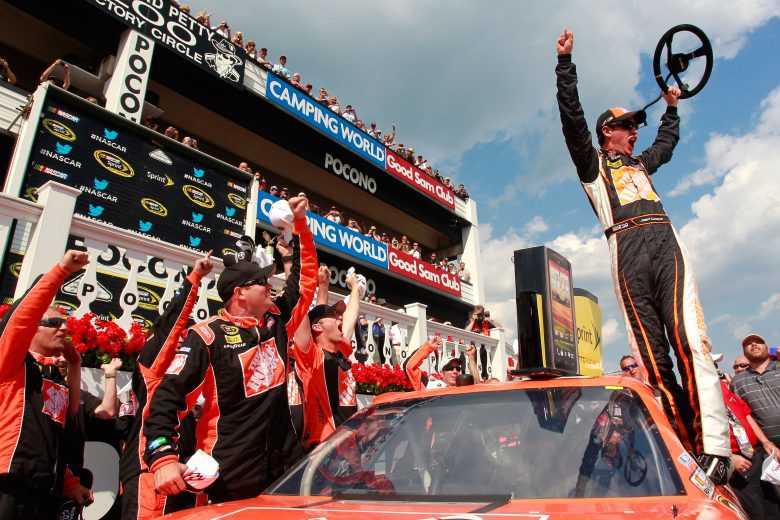Joey Logano celebrates in Pocono Victory Lane.