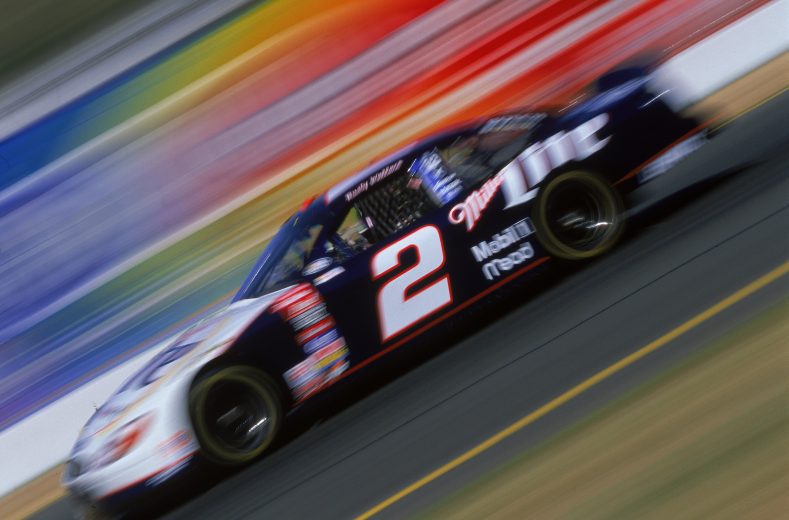 Rusty Wallace drives No. Miller Lite Ford Taurus.