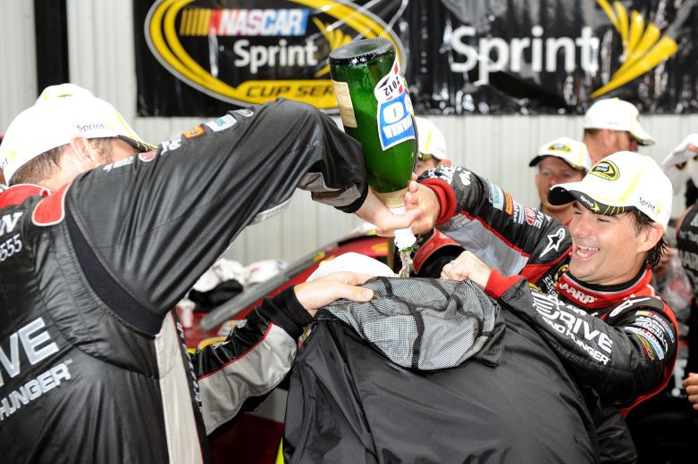 Jeff Gordon celebrates in Pocono Victory Lane.