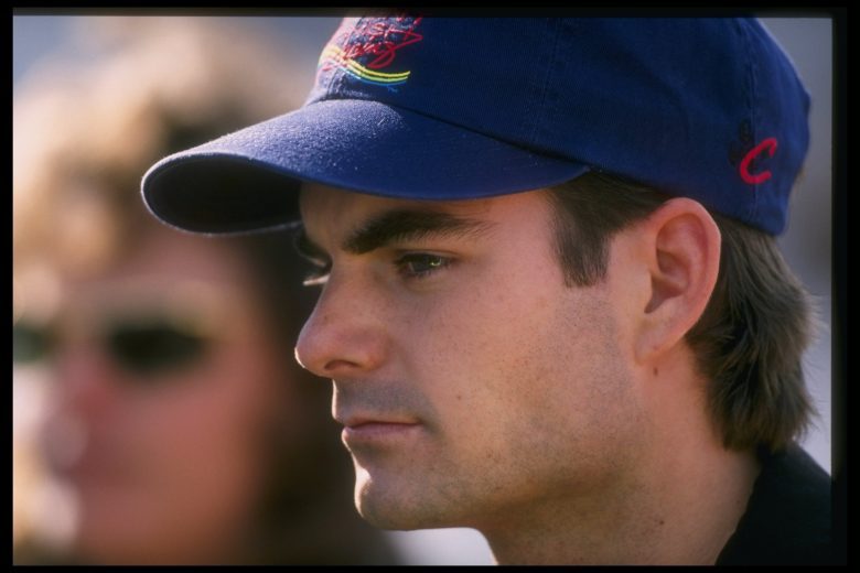 Jeff Gordon looks on.