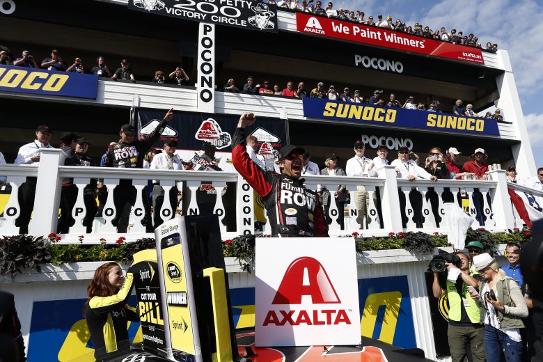 Martin Truex Jr. celebrates in Pocono Victory Lane.