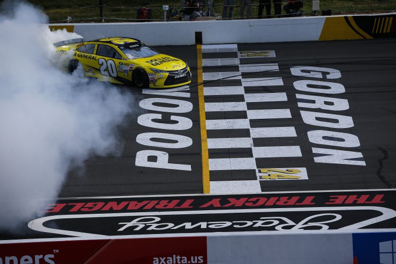 Matt Kenseth does a burnout at the finish line.