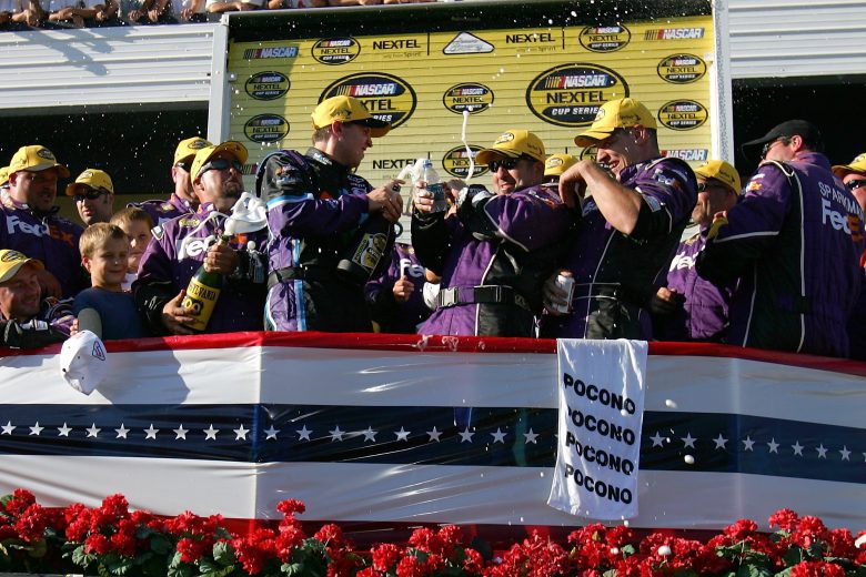 Denny Hamlin celebrates Pocono Victory Lane.